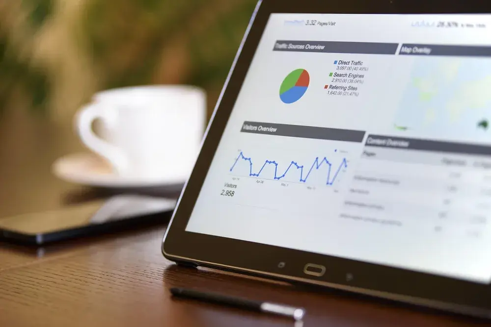Illustrative website and analytics content displayed on a tablet