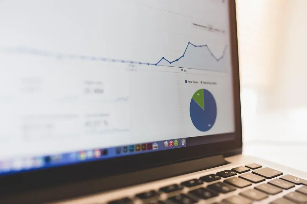 Illustrative line chart on a laptop screen